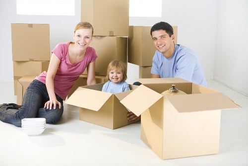Team member using safe lifting techniques during a move