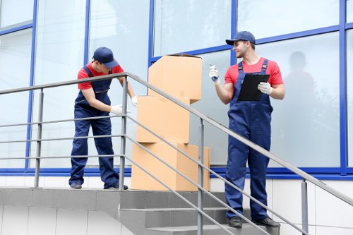 Supervisor reviewing a risk assessment before moving items