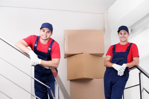 Crew loading furniture during a same day house removal in Battersea