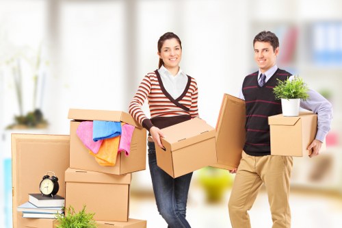 Removal team planning a house move in Battersea with boxes and furniture