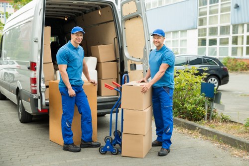 Furniture and household items being transported by van