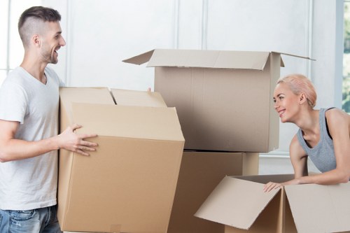 Professional removals service handling household furniture and boxes
